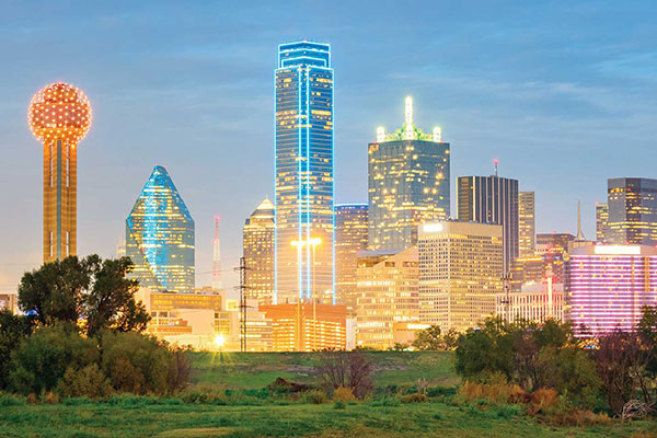 lighted skyline of Dallas, Texas, home of the MBA Conferences at UT Dallas