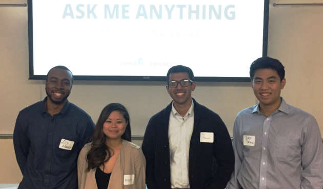 Comet Advisory founders Alex Mbanefo, Angie Luu, Tobin Abraham and Jeff Trinh standing in front of a screen that says, Ask me anything.