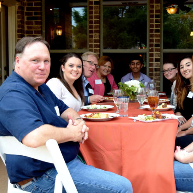 Everyone Sees Benefits as Alumni Host Dinners for Students