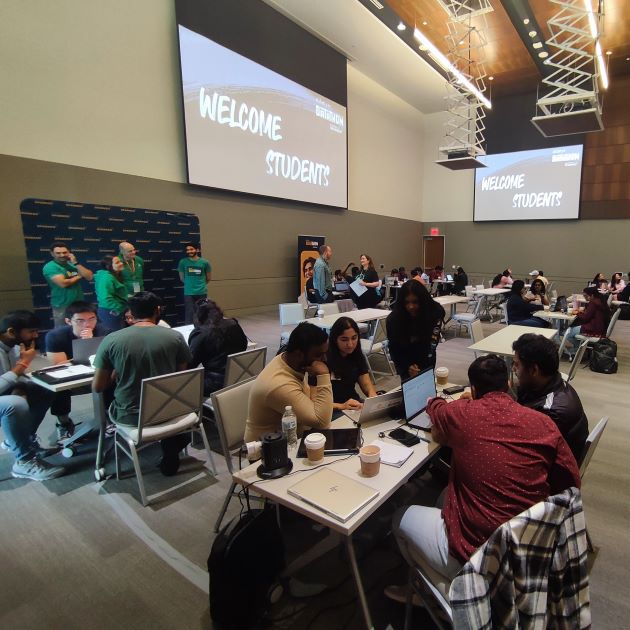 Photo of students participating in the Alteryx Datathon student competition.