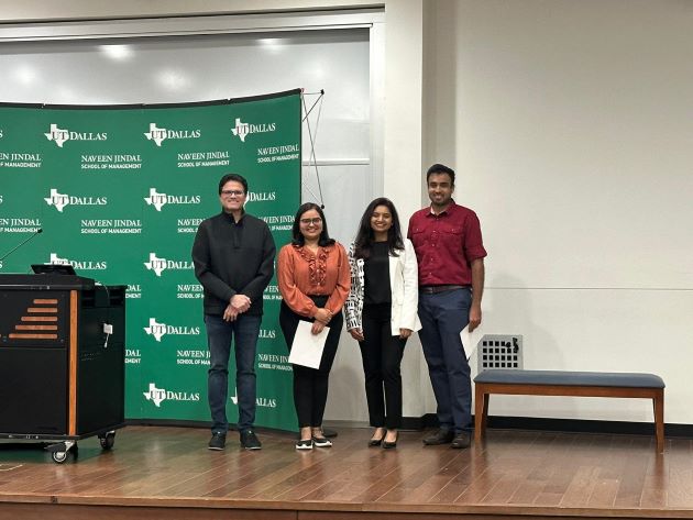 Photo of (from left) The Product League’s faculty adviser Dr. Vasant Gondhalekar; second place winner, Sri Kiran Pramoda Rani; Shalini Dinesh, senior product manager at Walmart and a competition judge; and Akshay Verma, who accepted first place honors on behalf of himself and fellow Team Maverick member Vinod Patil, who was unable to attend.