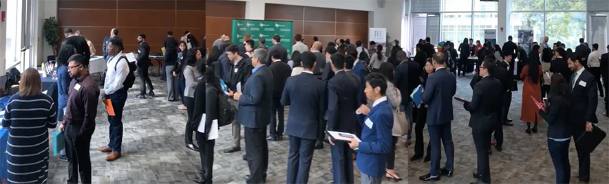 panoramic photo of more than fifty well-dressed students at the Finance career fair