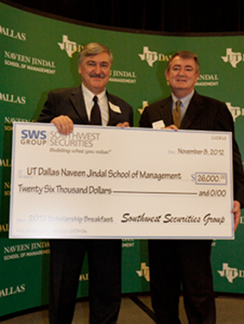 Dean Hassan Pirkul with President and CEO of Southwest Securities Group, James H. Ross