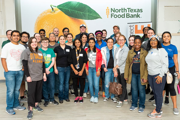 Jindal School alumni volunteer at the North Texas Food Bank.