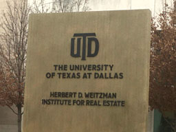 Herbert D. Weitzman Institute for Real Estate sign on the UT Dallas campus.