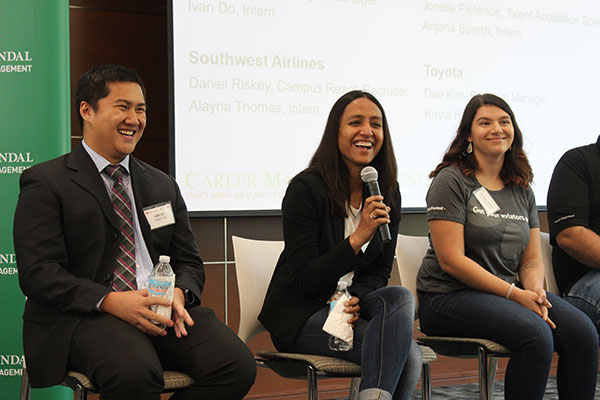 Jindal School alumni at a panel discussion about their full-time careers