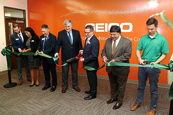Jindal School and GEICO leadership at the ribbon cutting ceremony for the GEICO room in the Career Management Center