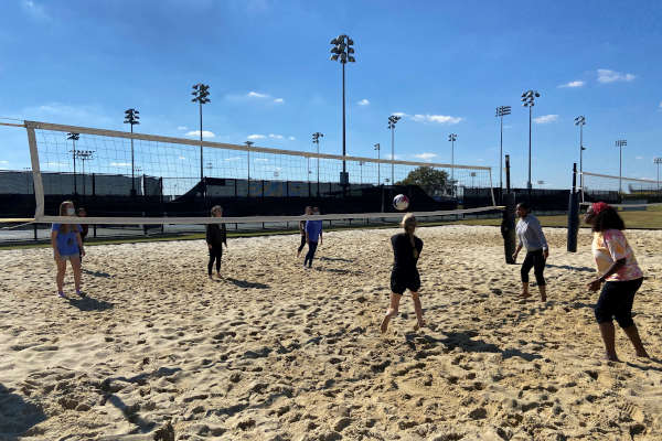 Davidson Management Honors Program students at a volleyball social