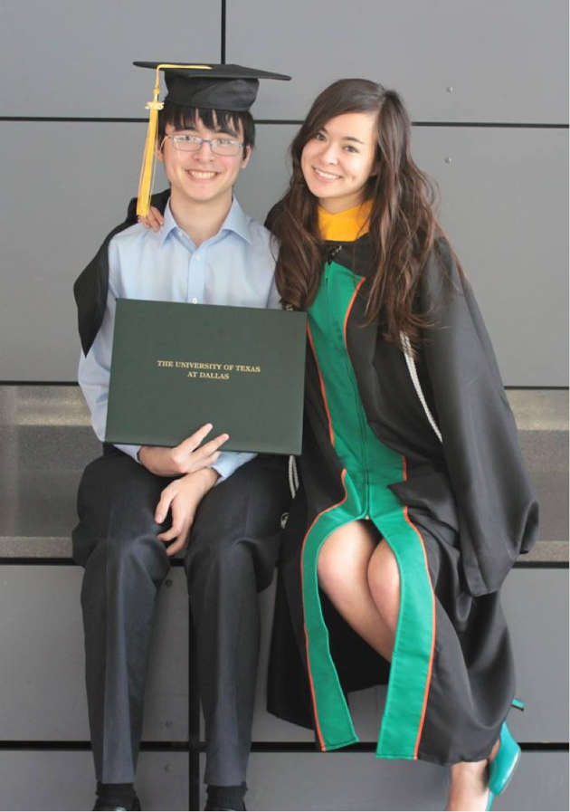 Michelle on her graduation day with her younger brother,