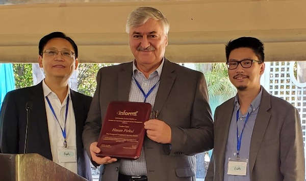 Information Systems Society (ISS) President D.J. Wu, Jindal School Dean Hasan Pirkul and ISS Vice President Jason Chan at the 2021 Conference on Information Systems Technology