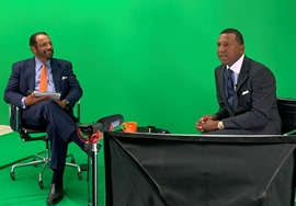 Calvin Jamison and Fred Perpall in front of a green screen