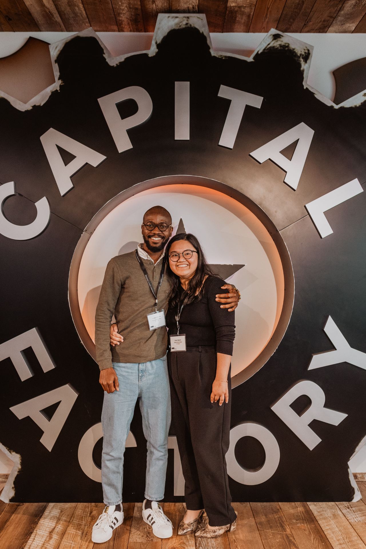 From left: Chukwudi Ukonne and Duyen Nguyen celebrate at a reception that concluded the 2022 Bridge Venture Fellowship.