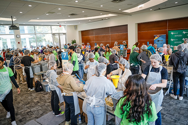 JSOM students helped pack nearly 23,000 meals for Ukraine