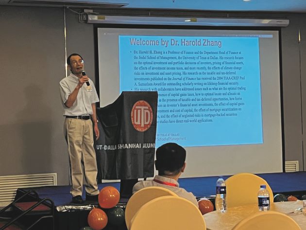 Photo of Harold Zhang speaking at the UTD Shanghai Alumni Event