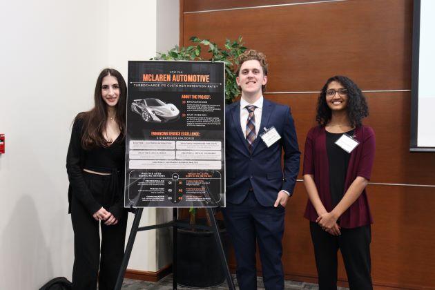 Photo of second place winning team McLaren project team members (from left) Ashley Rihani, Austin Pugh and Harsha Alexander