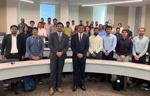Photo of D.C. Manjunath, Indian consul general (front row, right) meeting with Jindal School School students and Gaurav Shekhar (front row, left)