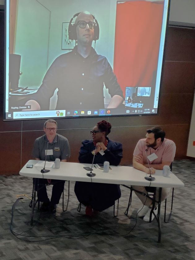 Photo of panel for "Neurodiversity at Work: The Employee Experience" held April 19, 2024 at the Naveen Jindal School of Management. Clockwise, from Top: Christian Bugslag, Geoffrey Barker, Nyamusi Lee, Connor Brady.