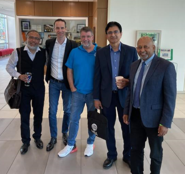 Photo of Representatives from kdc/one's Dallas office, who were at the event recruiting JSOM students. From left, Guillermo Chirino, hr manager, Michele Fabbri, vice president, and Bill Bignall, ehs manager, with Ramesh Subramoniam and Habte Woldu.