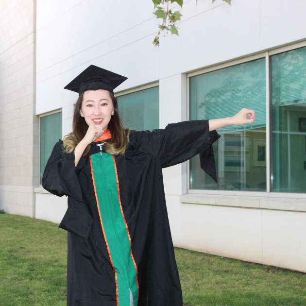 Hua Bai celebrates graduation