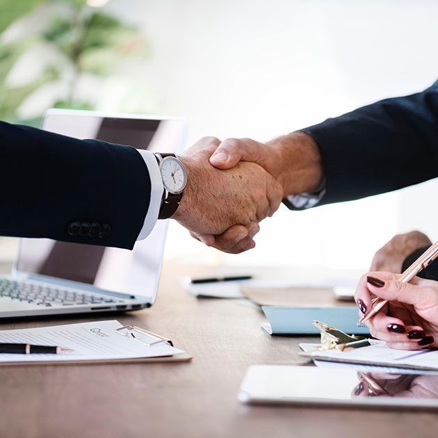 handshake over a business development deal
