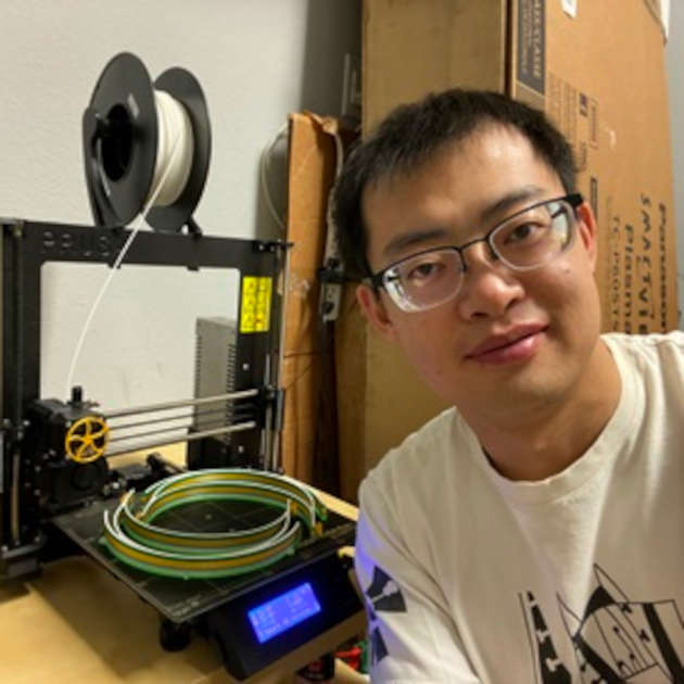 Bin Hu with his 3D printer