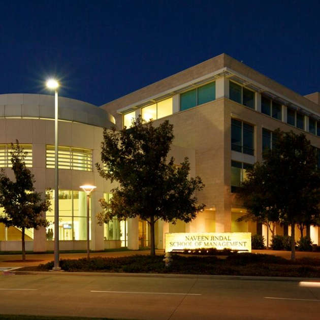 front of the JSOM building at night